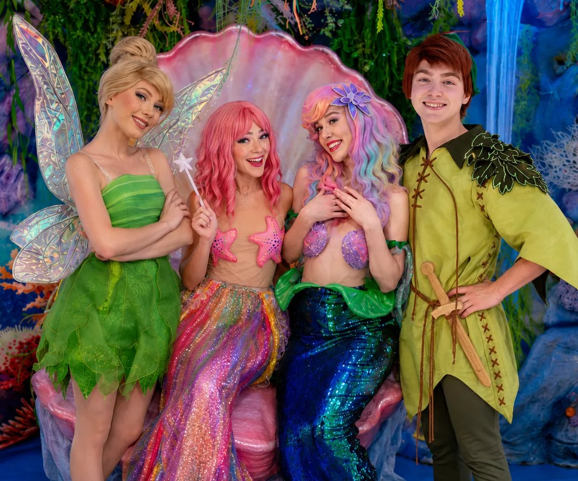 The Tink fairy, two Neverland Mermaids and Peter Pan, the cast of a Neverland Adventure Party in Newport Beach