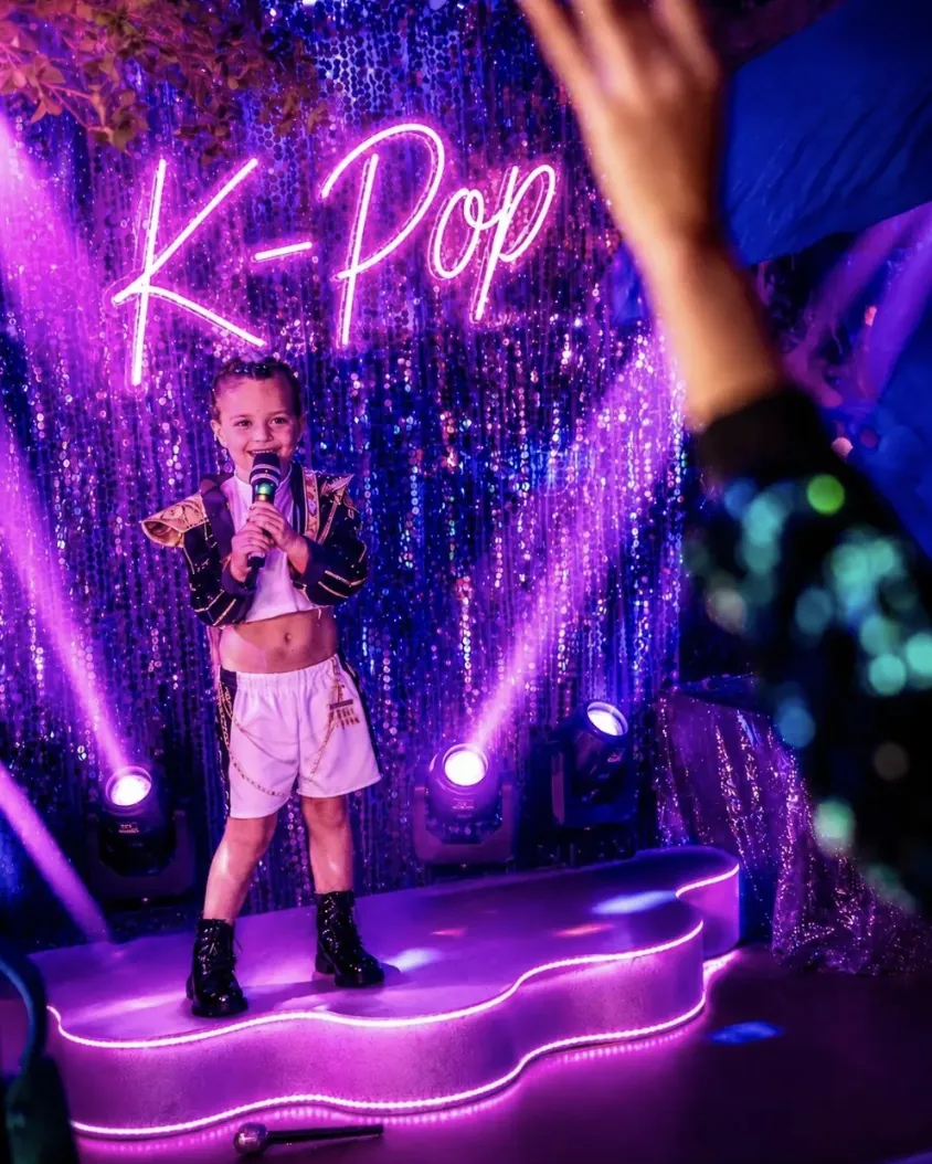The birthday star solo on the glowing K-Pop stage
