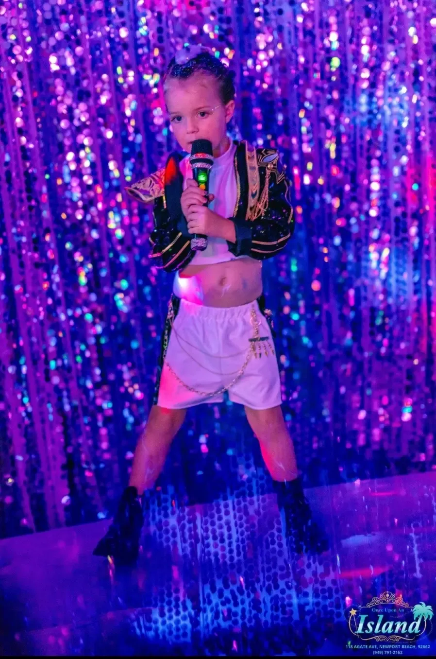 A young performer taking center stage