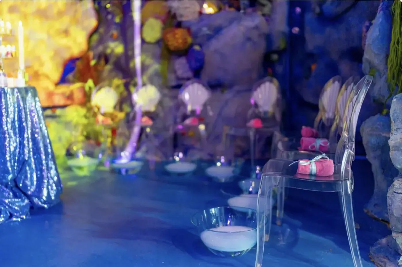 Shell chairs, foot-soak bowls and rolled towels ready for spa guests