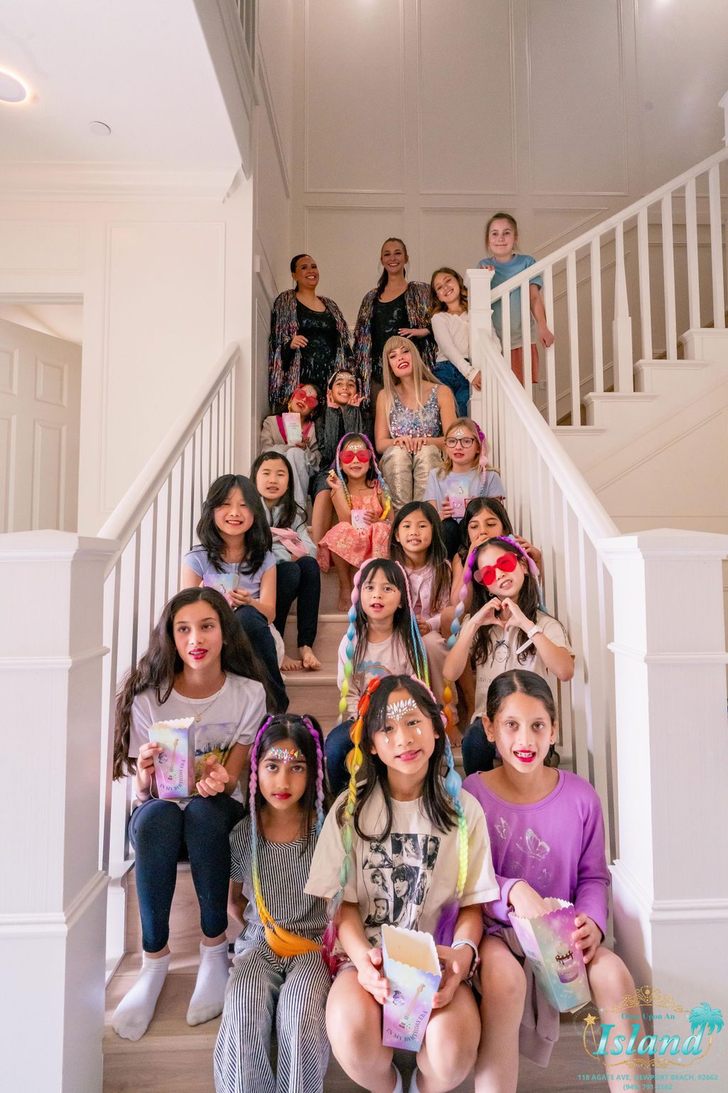 The whole guest list together at a Pop Star Party at home