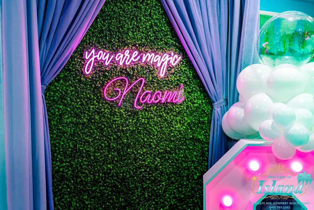 A personalized neon sign — you are magic — created for the celebration