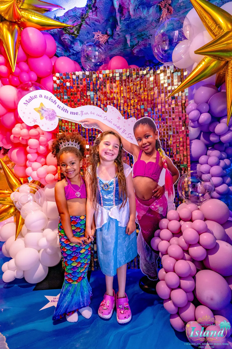 Friends at the make-a-wish photo wall