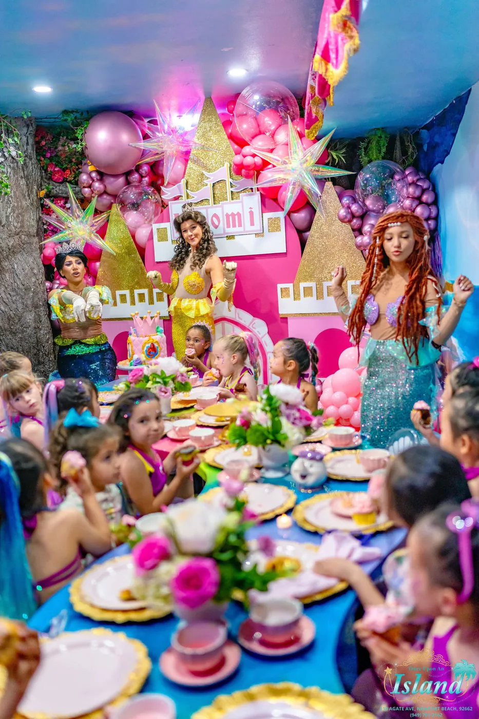 Princesses leading the celebration at the royal tea table