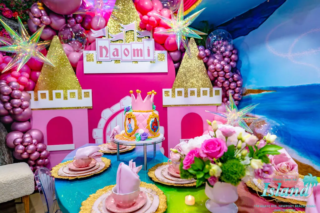 A custom castle cake beneath her name in lights