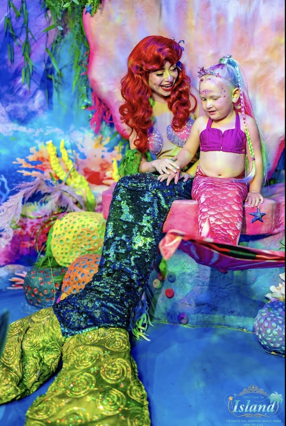 The Mermaid Princess and a little mermaid together in the lagoon