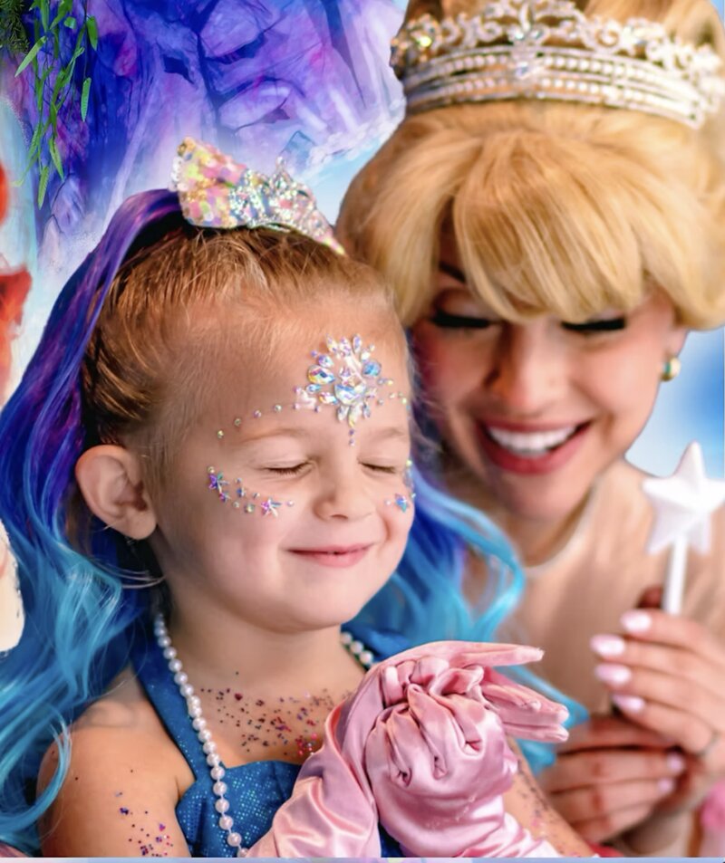 A princess adding glitter makeup and face gems during the Jellyfish Salon Hour